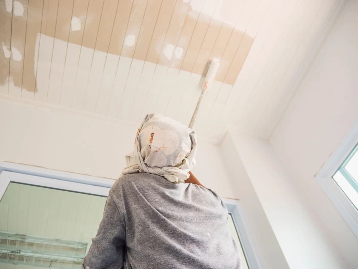 Plasterer installing a new ceiling during a Sydney home renovation